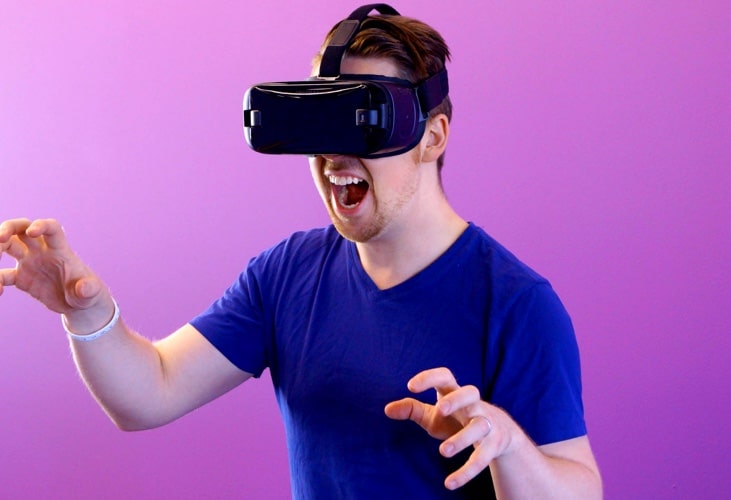 Man playing with a VR Headset